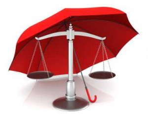 umbrella over scales--exemption as protection from legal process